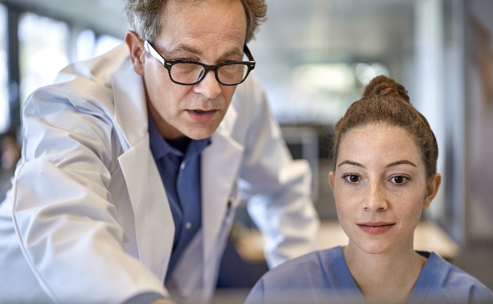 Photo of two clinicians